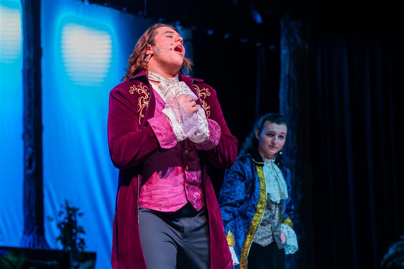 Students perform onstage